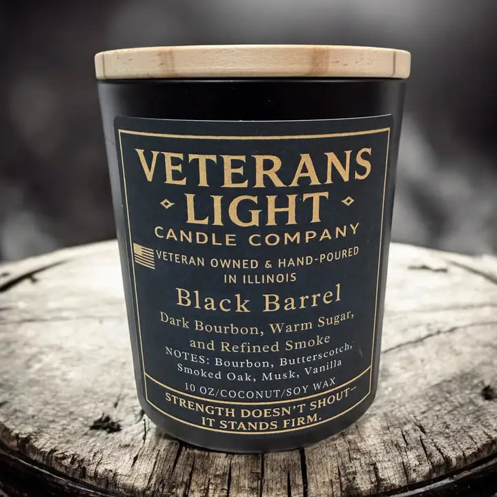 Candle from Veterans Light Candle Company on a wooden surface
